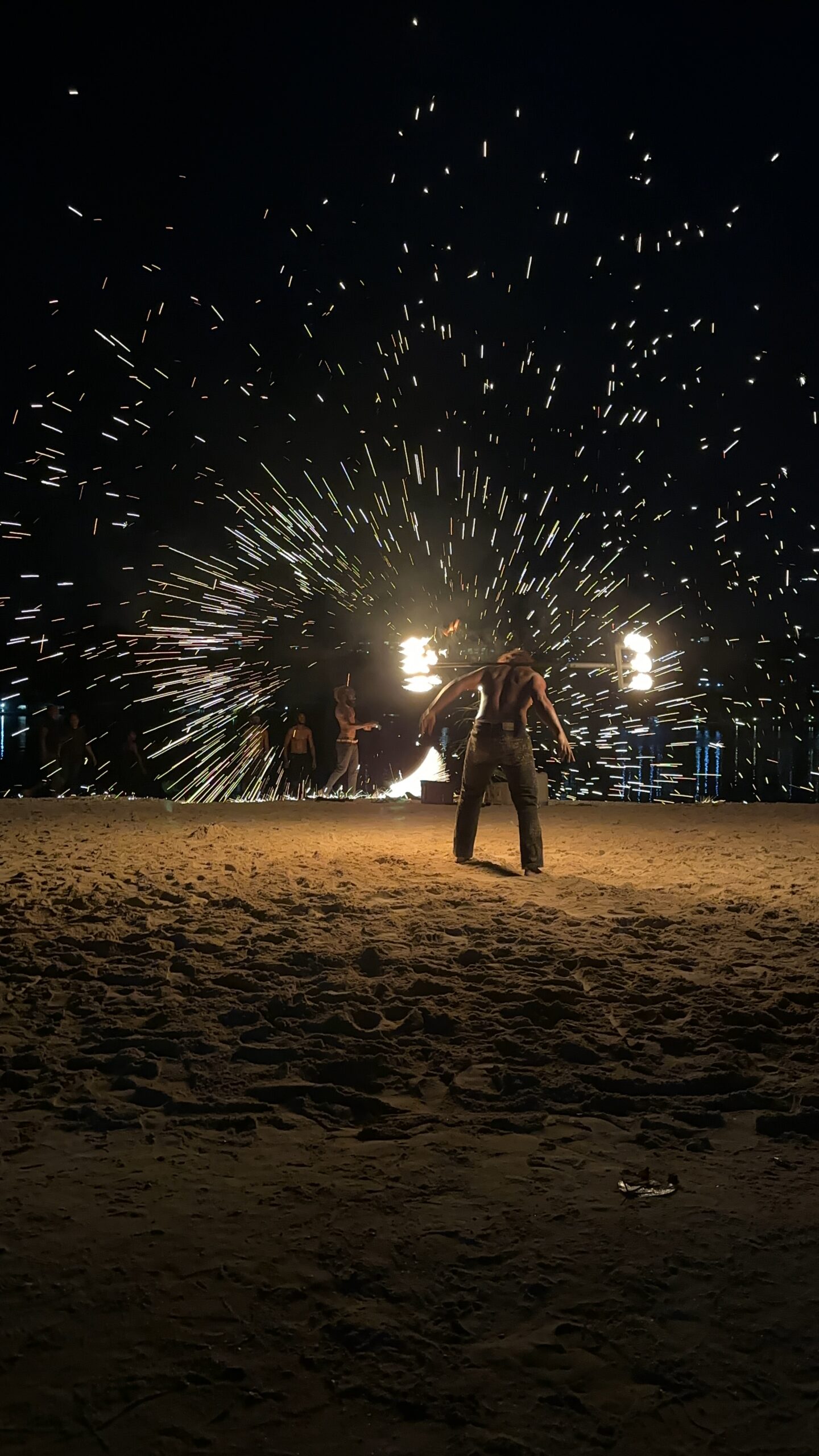 Tonia, Jayden, and Hailey bonding over a cultural activity while traveling to Vanuatu.